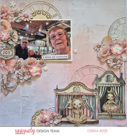 Dressed in Daydreams scrapbook layout featuring Paper Theatre ephemera with fairy characters, vintage clock faces, watercolour florals and photo mat by Debra Beer for Uniquely Creative 