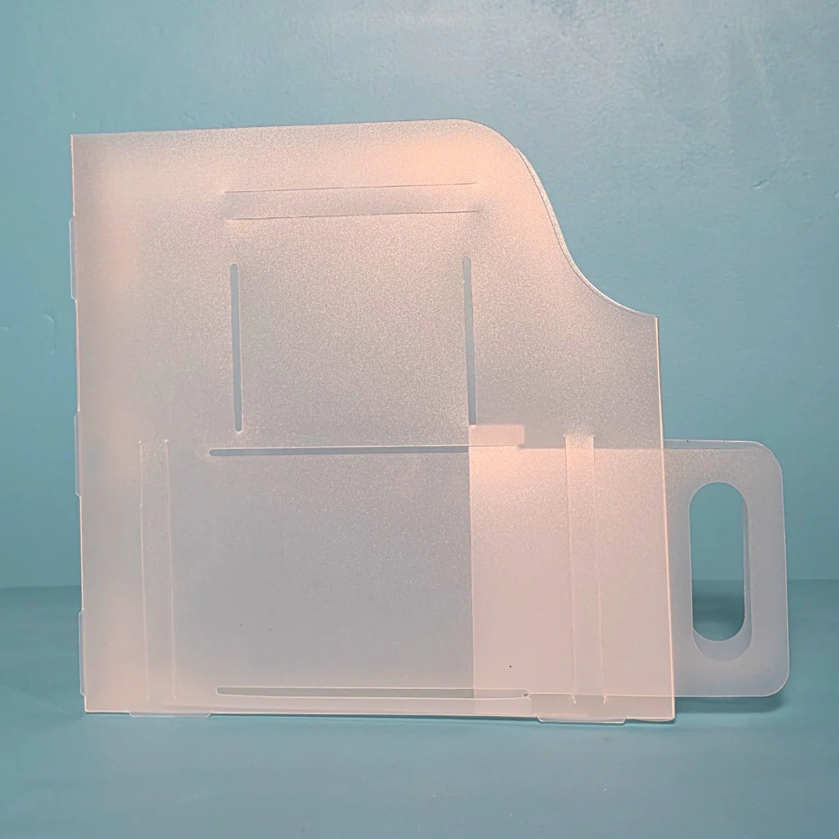 The Organized Option 12x12 Paper Handle-It shown side-on with handle in front shelf-pull position for easy retrieval