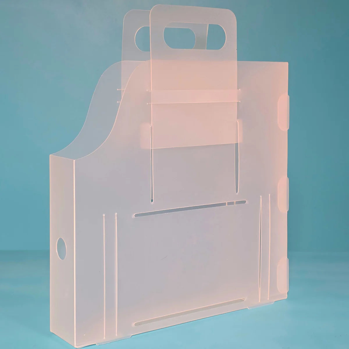 The Organized Option 12x12 Paper Handle-It upright with handles extended at the top for carrying, angled view