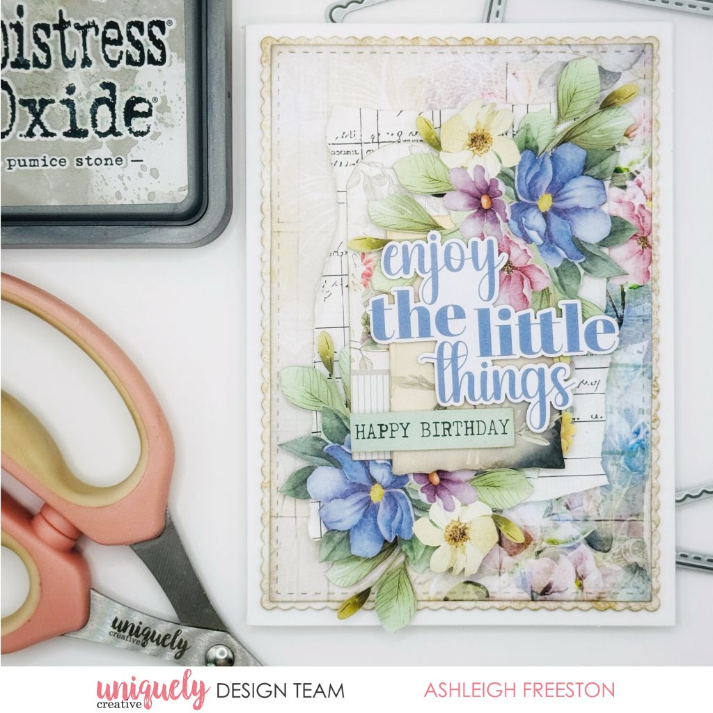 Handmade birthday card by Ashleigh Freeston using Uniquely Creative Floral Archives collection – features layered florals in blue, purple, and pink tones, scalloped border, and sentiments “enjoy the little things” and “Happy Birthday.” Vintage-style background with musical notes adds charm to this elegant design.