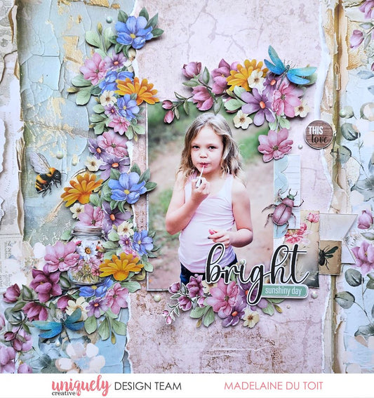 Scrapbook page by Madelaine Du Toit using Uniquely Creative Floral Archives collection – features a joyful photo of a girl with a lollipop, surrounded by vibrant layered florals, whimsical insects, and torn pastel paper textures. Sentiments like “bright sunshiny day” and “THIS love” add warmth to this playful, nature-inspired design.