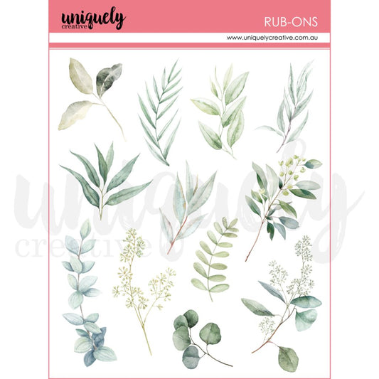 Uniquely Creative Botanical Rub-Ons featuring watercolour-style leaves and foliage in soft green tones—perfect for transferring delicate botanical accents onto scrapbook pages, cards, and journals.