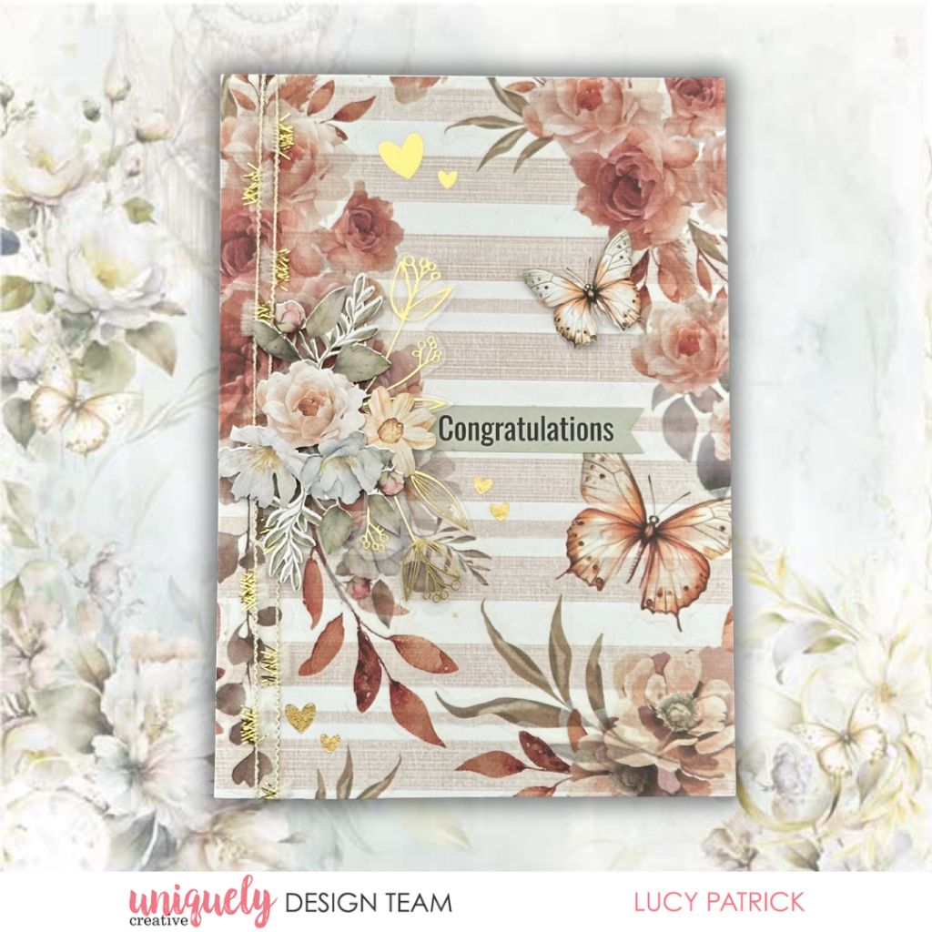 Handmade congratulations card by Lucy Patrick using Uniquely Creative Bohemian Escape collection – features vellum creative cuts watercolour roses, butterflies, gold acetate sheet embellishments, and a “Congratulations” sentiment on a green-gray banner. Elegant layered design perfect for celebrating special milestones.