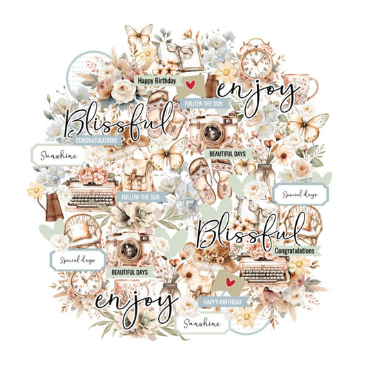Uniquely Creative Bohemian Escape Creative Cuts – die-cut cardstock pieces featuring vintage florals, butterflies, cameras, clocks, books, and celebratory phrases. Perfect for scrapbooking, cardmaking, and mixed media projects with a soft pastel palette.