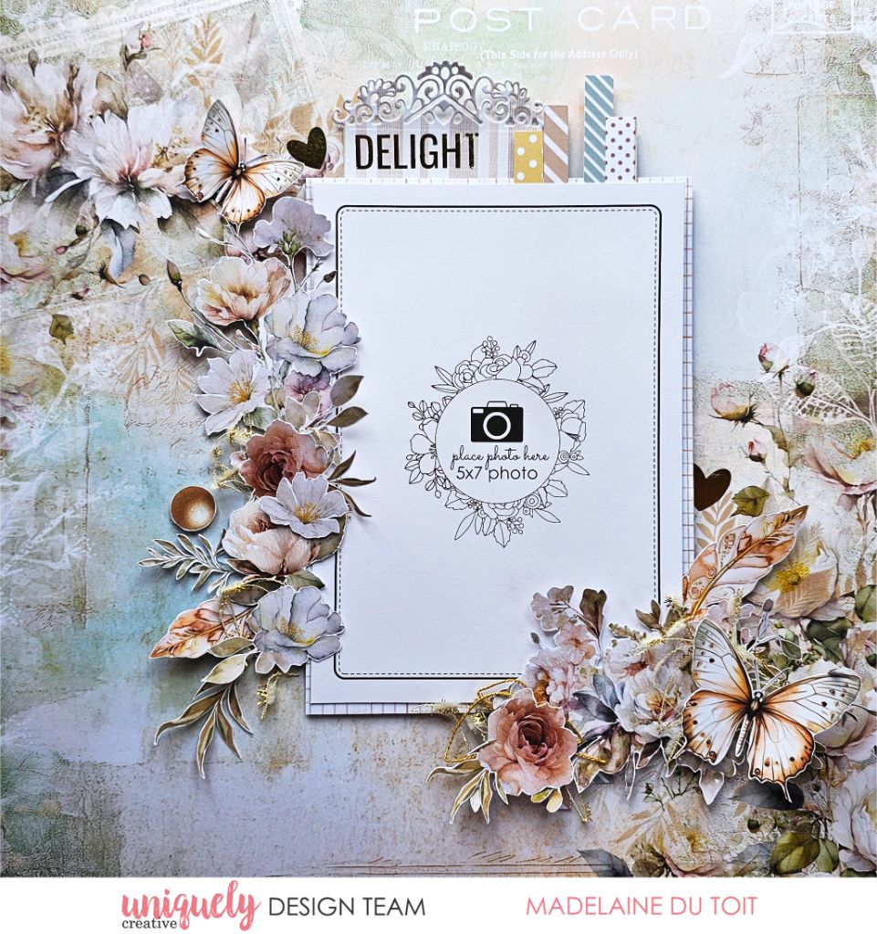 Scrapbook page by Madelaine Du Toit using Uniquely Creative Bohemian Escape collection – features a 5x7 photo place-holder framed by layered florals, butterflies, and vintage-style paper accents. Soft textured background with postcard motifs and sentiment “DELIGHT” creates an elegant, memory-keeping design.