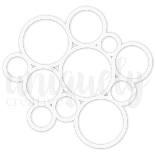 Uniquely Creative Circles Overlay — white laser-cut overlay featuring overlapping circles in varying sizes, approximately 10 by 10 inches, for scrapbooking and mixed media projects