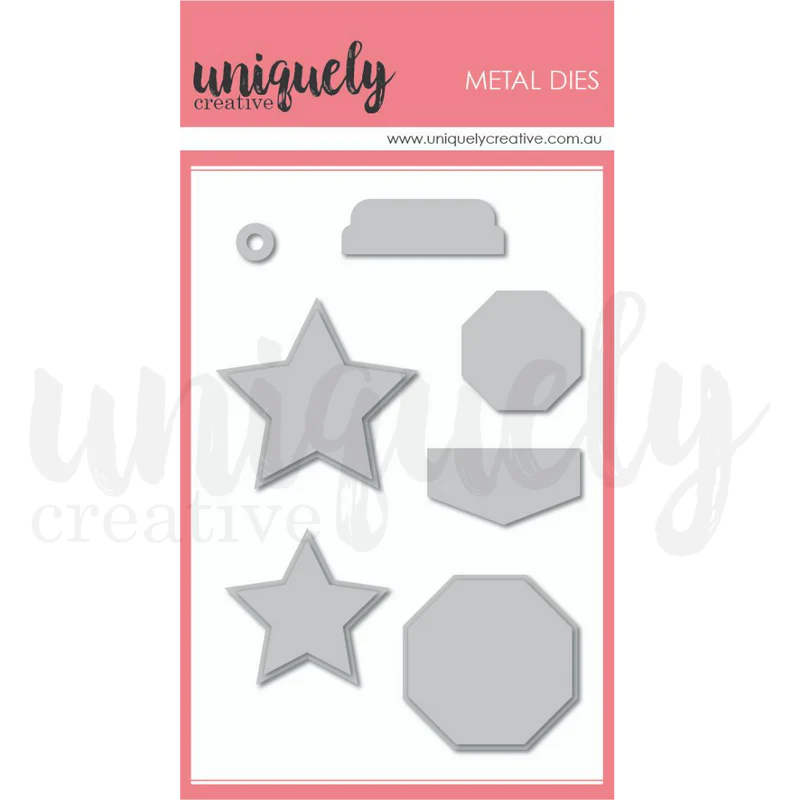 Uniquely Creative Cut-A-Part Essentials #3 Die showing 7 metal dies including circle eyelet, scalloped tab, 2 outlined stars, large octagon, hexagon and small octagon