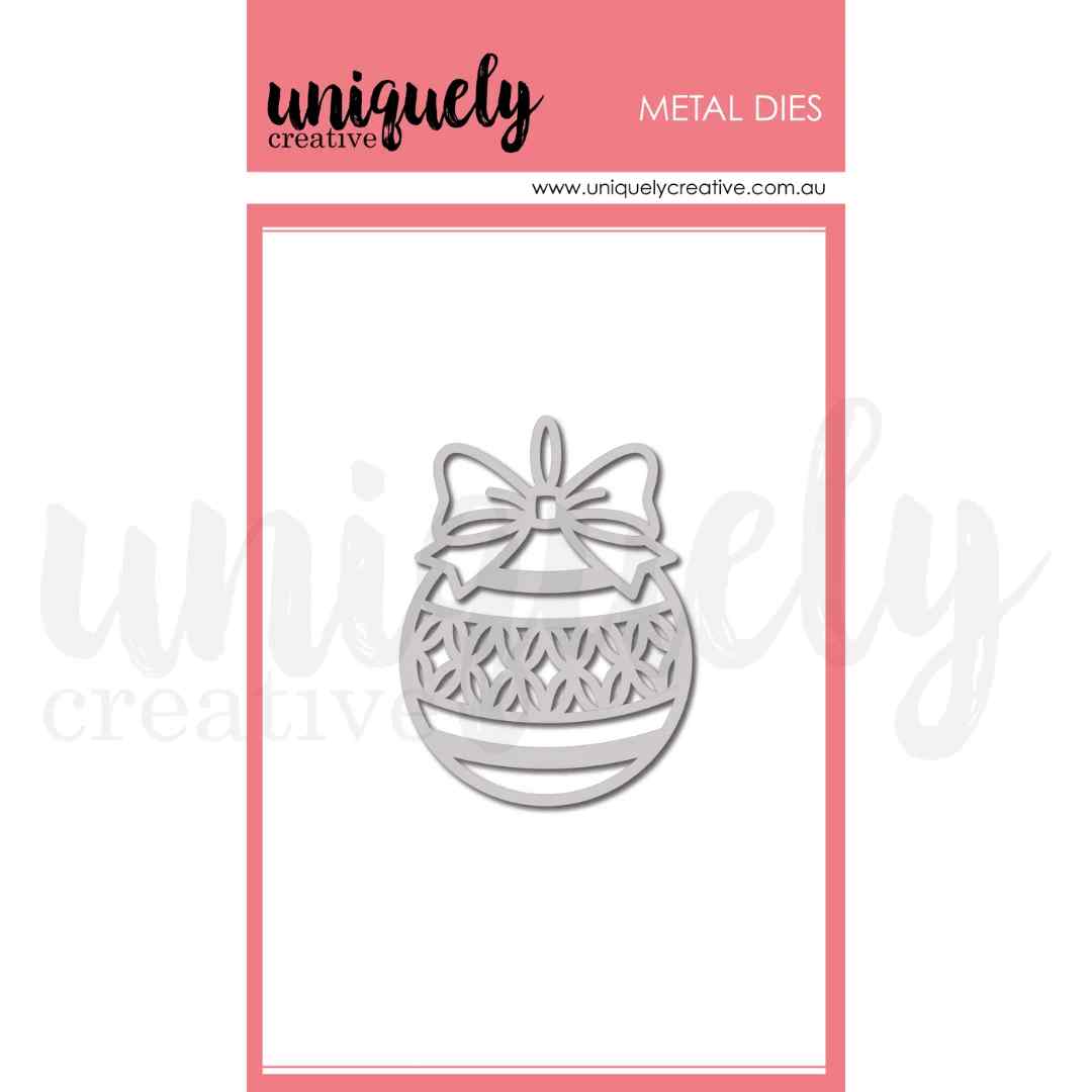 Uniquely Creative Decorative Bauble metal die featuring a round ornament with a bow and lattice pattern centre