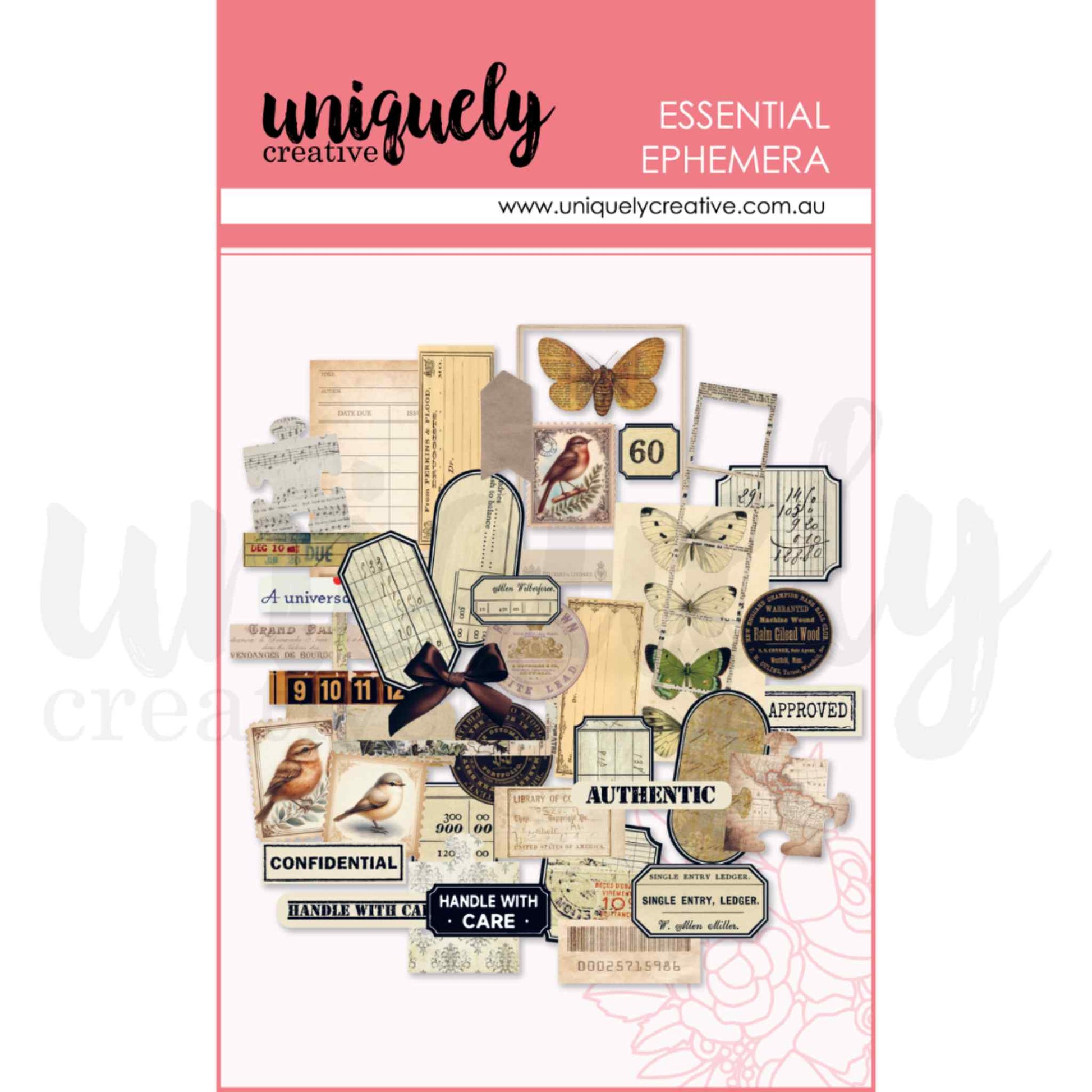Uniquely Creative Curiosities Ephemera pack showing pre-cut vintage die-cut pieces including botanical bird and butterfly specimens, library card pockets, ledger strips, tags, sheet music, bow, and rubber stamp word labels in cream, black, and natural tones