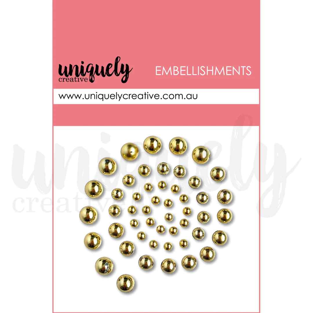Uniquely Creative gold pearl embellishments in assorted sizes with a reflective metallic finish