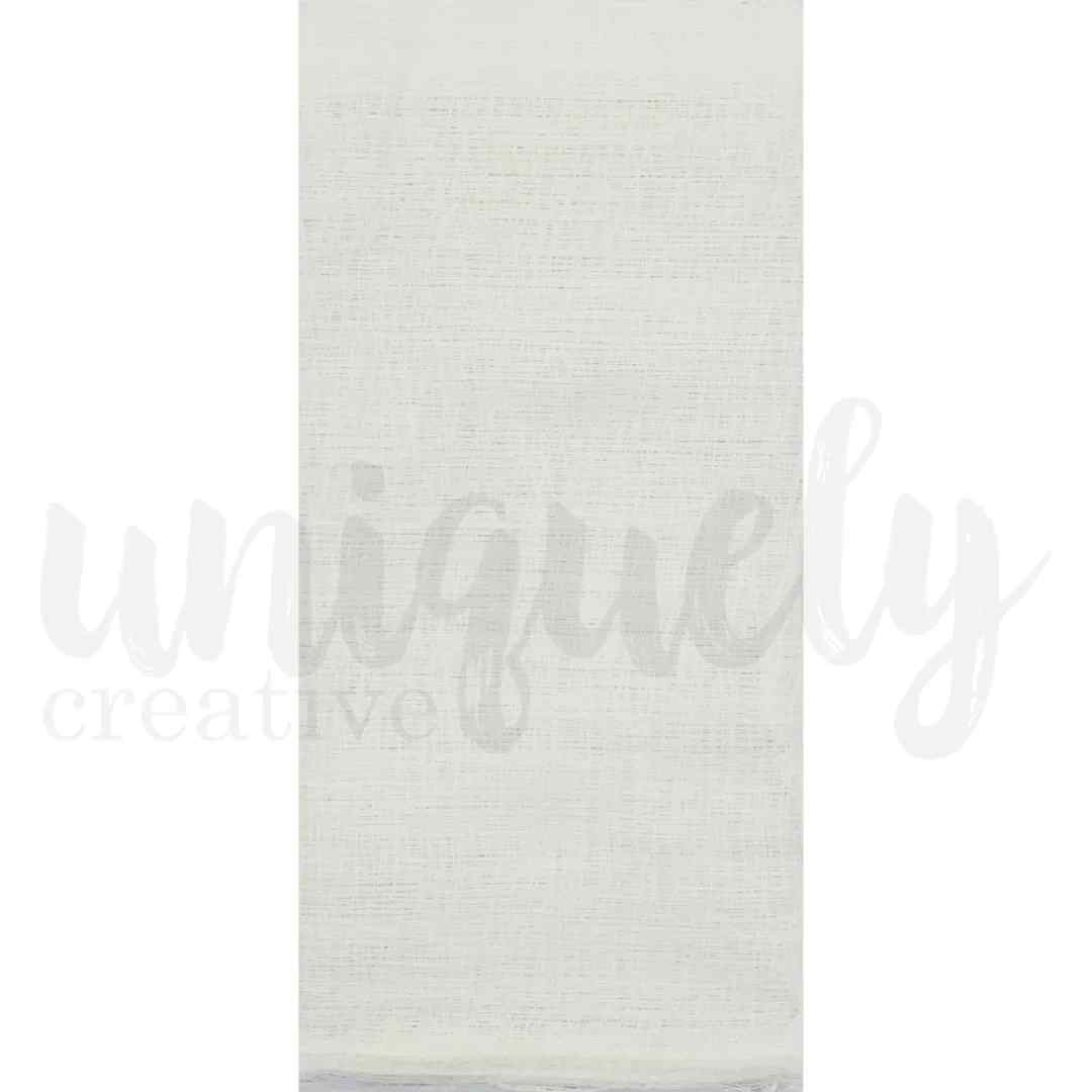 Uniquely Creative white muslin fabric sheet with a fine woven texture for cardmaking and scrapbooking