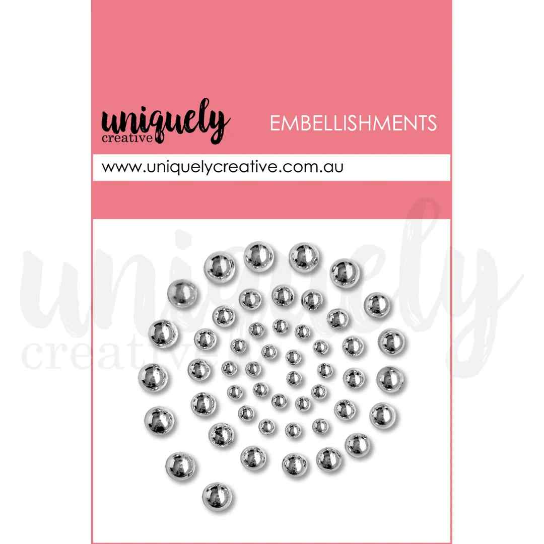 Uniquely Creative silver pearl embellishments in assorted sizes with a reflective metallic finish