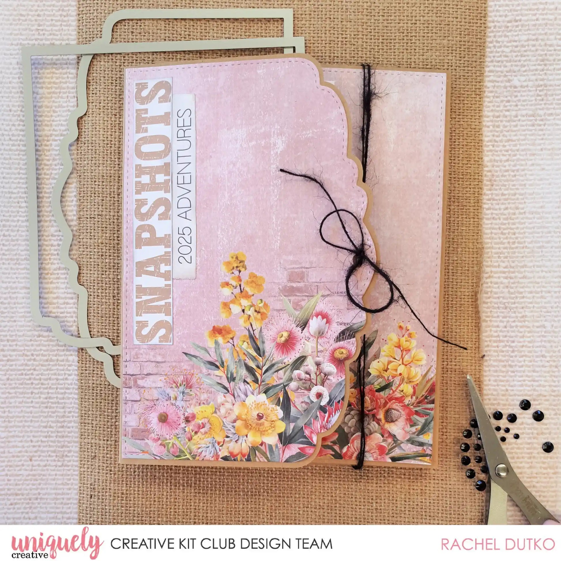 Decorated 6x8 Flip Folio Album using Uniquely Creative dies, featuring floral papers and scalloped panels — design team sample