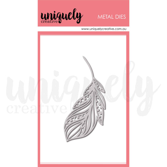 Uniquely Creative Free Spirit Feather Die — metal cutting die featuring an ornate feather with intricate internal cutwork, flowing barbs, and dot details, approximately 5½ by 5½ inches