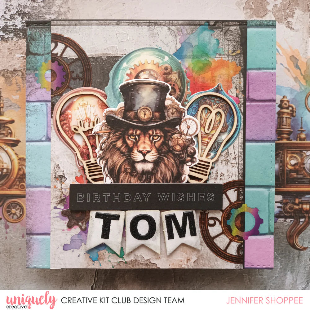 Uniquely Creative Black Glitter Alpha Stickers spelling "TOM" on a steampunk birthday card by Uniquely Creative Kit Club designer Jennifer Shoppee