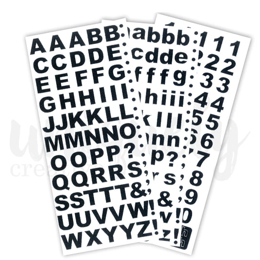 Uniquely Creative Black Glitter Alpha and Number Stickers — three sheets showing uppercase, lowercase and number stickers with bold black glitter finish