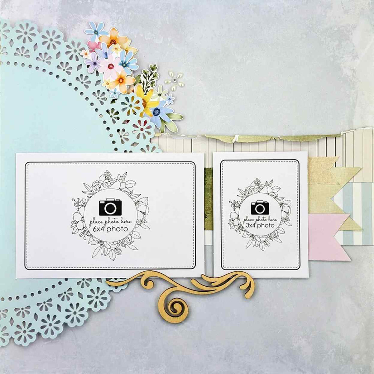 Scrapbook layout sample featuring a light blue circular floral lace decorative base layer behind two white photo mats, with floral embellishments and pastel patterned paper.