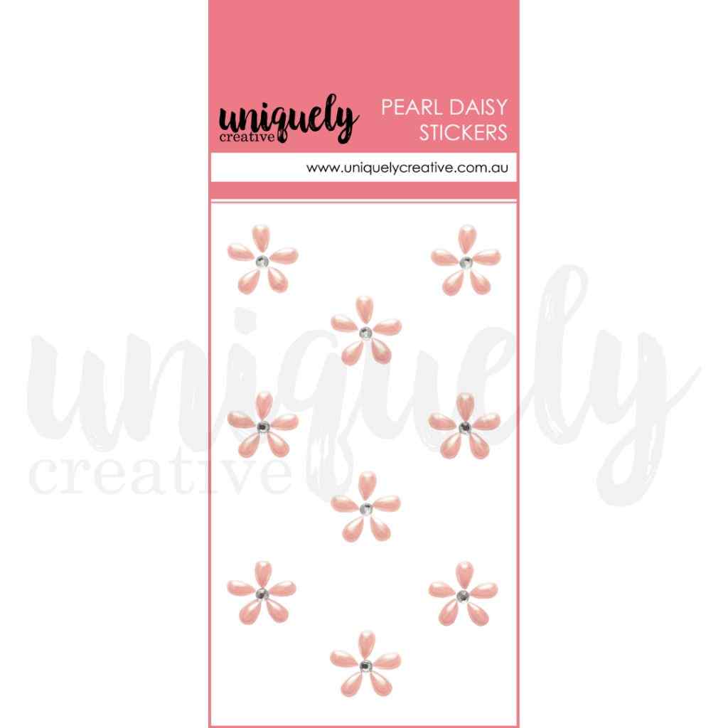 Uniquely Creative Pearl Daisy Stickers in pink, showing nine small pink five-petal flower stickers with rhinestone centres on a white card with a pink header.
