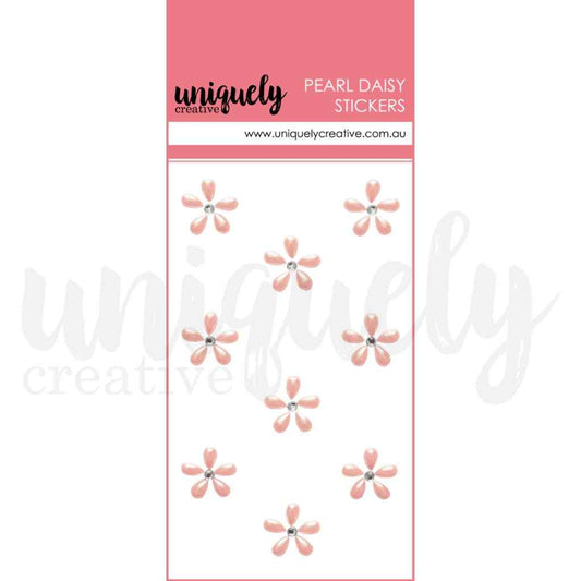 Uniquely Creative Pearl Daisy Stickers in pink, showing nine small pink five-petal flower stickers with rhinestone centres on a white card with a pink header.