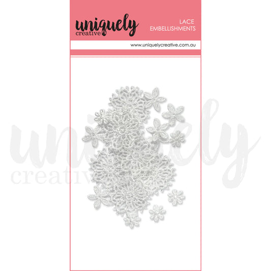 Uniquely Creative Lace Daisies — 18 white lace flower embellishments in assorted sizes on packaging
