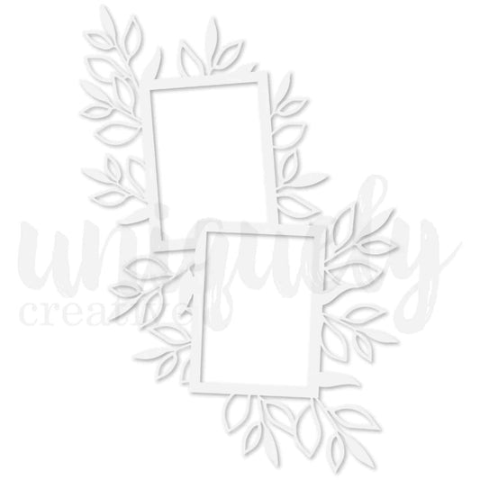 Uniquely Creative Leafy Frames Overlay — white laser-cut overlay featuring two overlapping rectangular frames with flowing leafy branch details, approximately 9½ by 7 inches