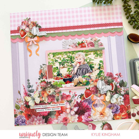 Scrapbook layout using Uniquely Creative Oh So Lovely collection featuring layered floral papers, strawberry embellishments, scallop border and Oh Sweetie sentiment with a child's photo by Kylie Kingham