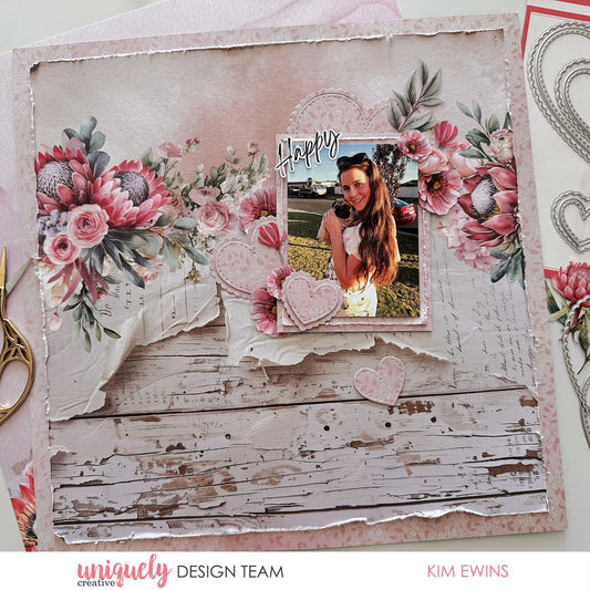 Paperbark Blooms scrapbook layout with king protea, magnolia, die-cut hearts and Happy title by Uniquely Creative