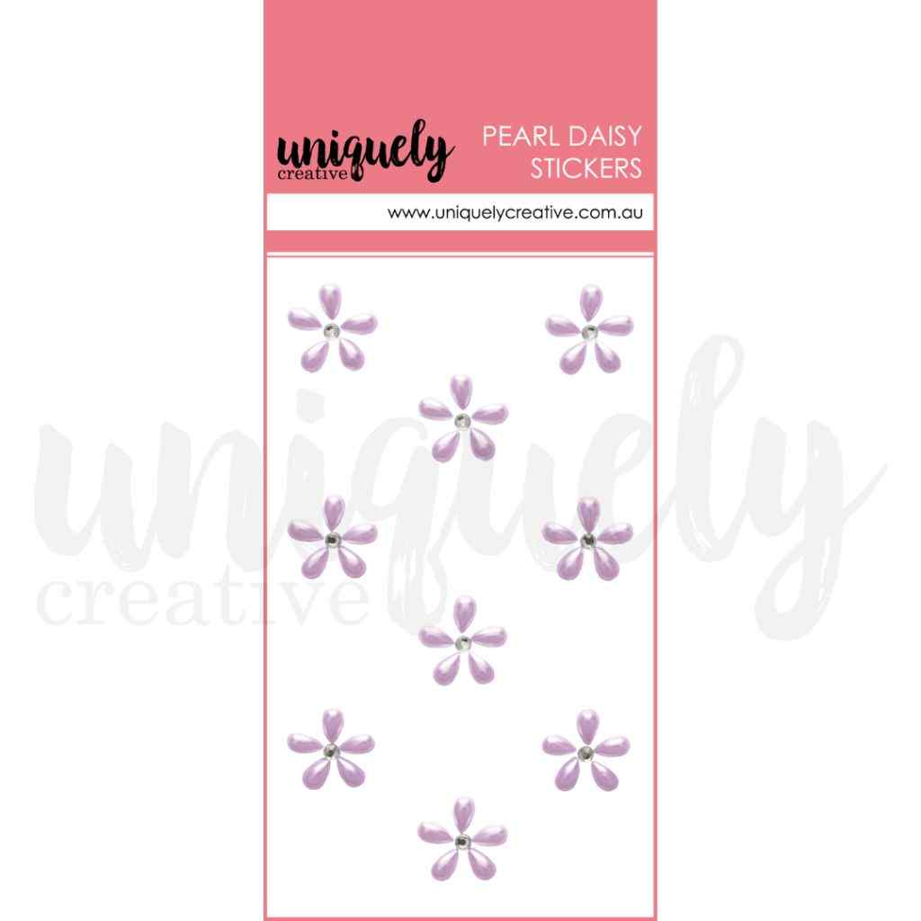 A sheet of Uniquely Creative Pearl Daisy Stickers featuring small light purple five-petal flowers with rhinestone centers, presented on a white card with a pink header.
