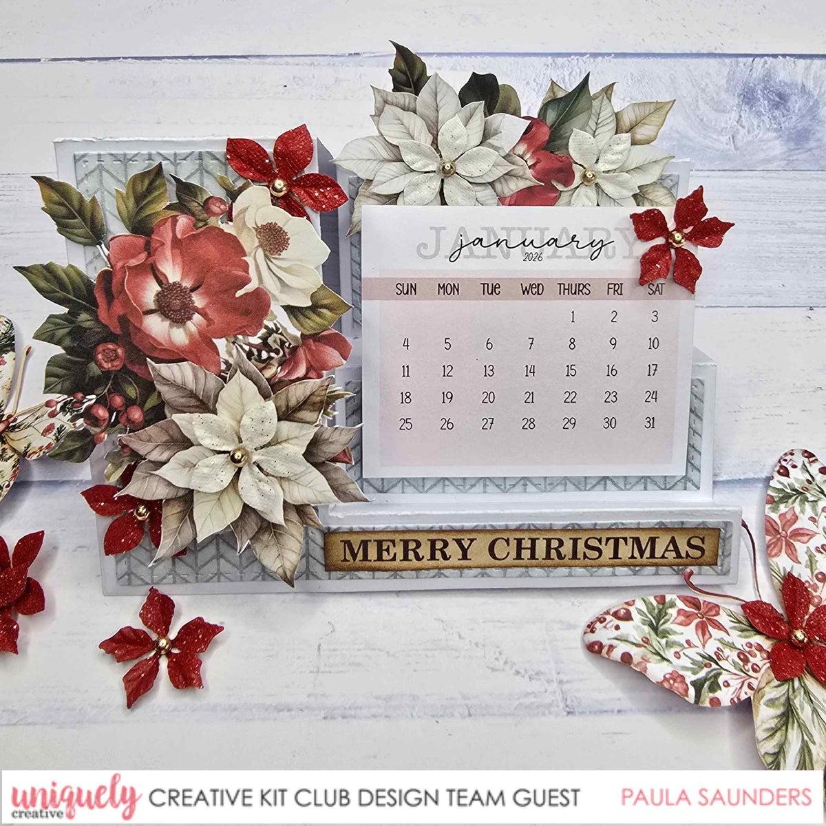 Christmas side stepper calendar card with red and white flowers and a January calendar panel