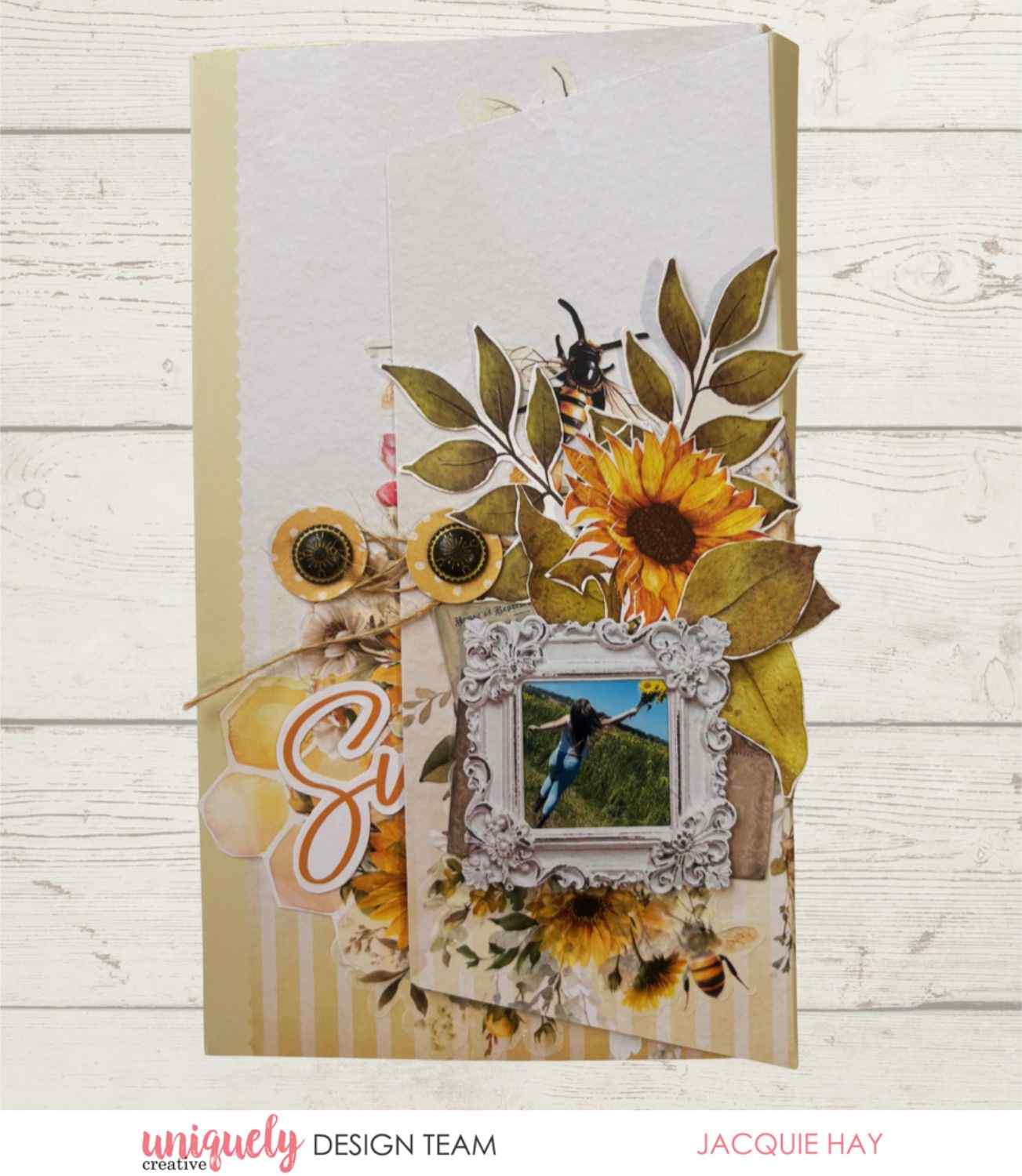 Uniquely Creative Sweet As Honey fold-out album sample showing cover decorated with sunflowers, bees, leaves, and a framed photo, created by Jacquie Hay