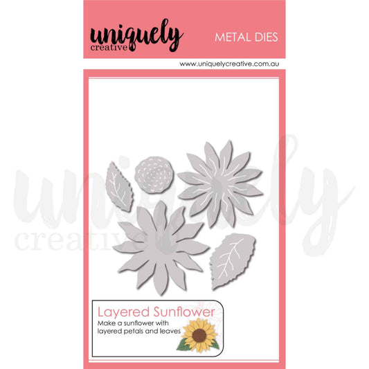 Uniquely Creative Sweet As Honey Layered Sunflower Die set of 5 metal dies showing two sunflower petal layer dies in different sizes, a circular spiral flower centre die, a small petal layer die, and two veined leaf dies 
