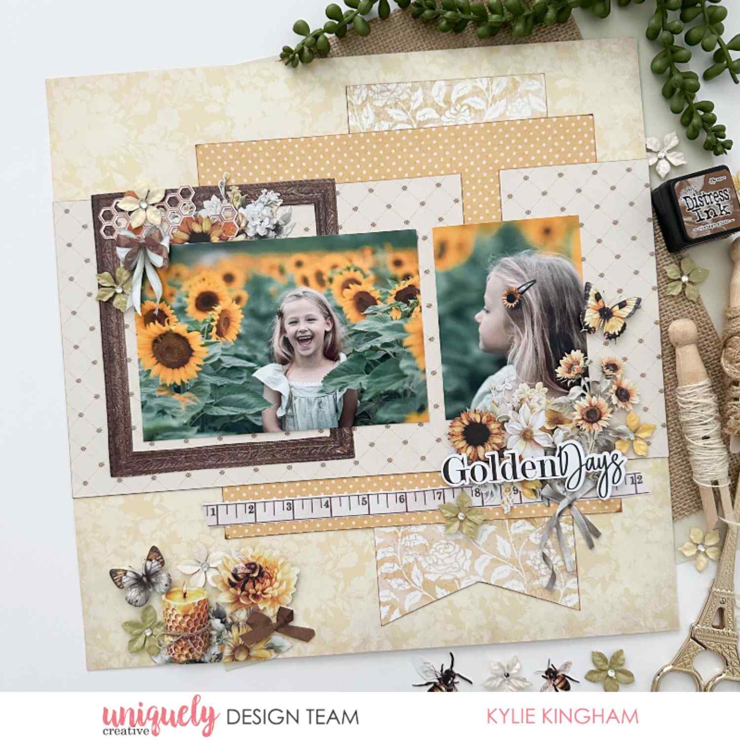 Uniquely Creative Sweet As Honey scrapbook layout titled "Golden Days" featuring two photos of a child in a sunflower field, layered patterned papers, butterfly, candle, and floral embellishments, created by Kylie Kingham