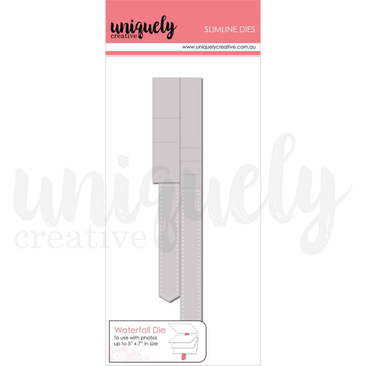 Uniquely Creative Slimline Waterfall Die packaging showing two die-cut shapes: a tall segmented rectangular strip with scored fold lines for layering photos, and a narrow pennant flag strip with stitched border detail. Waterfall Die accommodates photos up to 5x7 inches. 