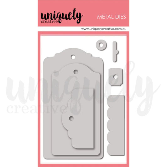 Uniquely Creative Tags Tops 'n' Tails Die 2.0 showing 7-piece metal die set with large and small vintage tag shapes, decorative tops, scalloped edge, reinforcement circles and hanging bar