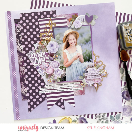 Birthday scrapbook layout with Uniquely Creative Ultraviolet Delight collection featuring purple polka dot papers, lavender florals, and gold accents by Kylie Kingham
