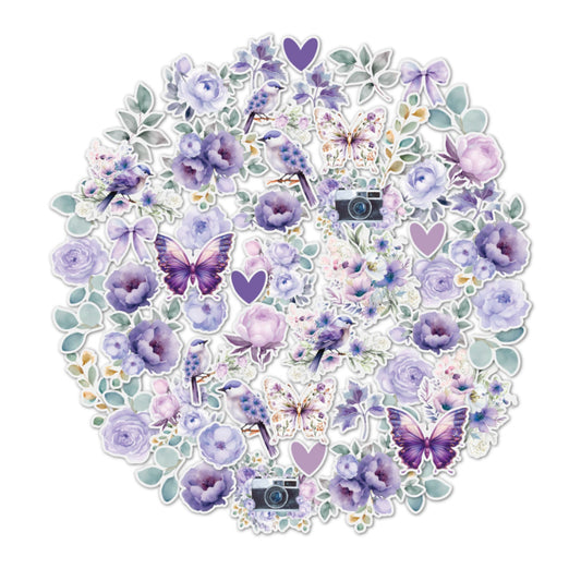Uniquely Creative Ultraviolet Delight Vellum Creative Cuts showing translucent self-adhesive die-cuts including watercolour florals, butterflies, vintage cameras, bows, and foliage in purple and sage green