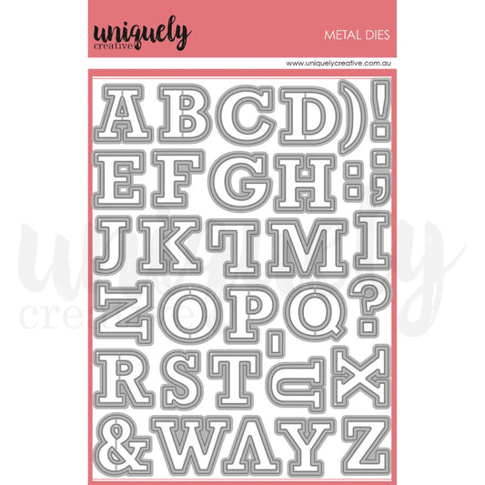 Uniquely Creative Uppercase Outline Alphabet Metal Dies showing complete A-Z alphabet and punctuation marks in outline style on pink branded packaging
