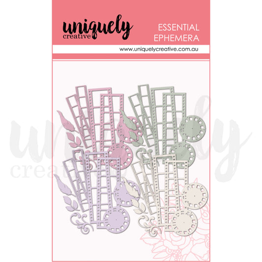 Uniquely Creative Whispers of Wisdom acetate layering ephemera showing die-cut transparent pieces in blush pink, sage green and neutral tones with vintage botanical frames, leaves, clocks and decorative flourishes 