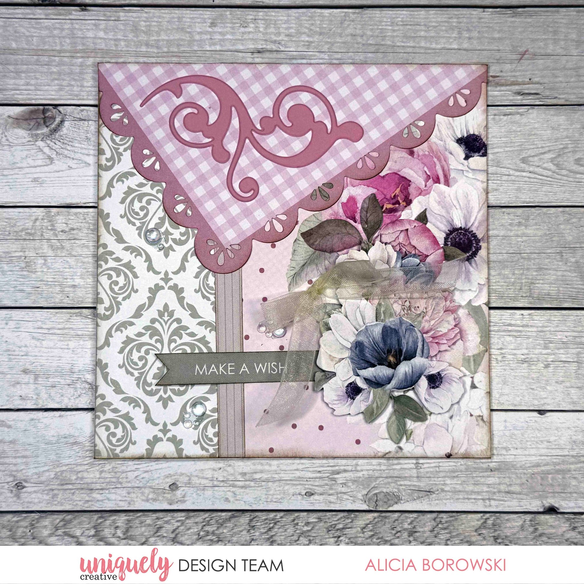 Handmade card featuring Whispers of Wisdom collection with pink gingham die-cut scalloped corner, grey damask pattern paper, watercolour anemone florals in pink and blue tones, and Make a Wish sentiment