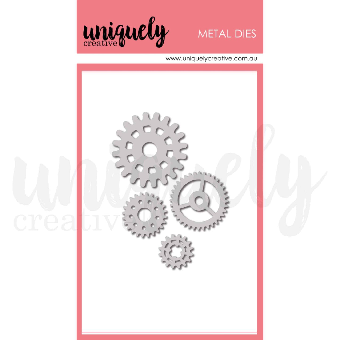 Uniquely Creative Cogs Die UCD2241 metal die set showing four gear cog dies in sizes approximately 3/4 inch, 1 inch, 1.5 inch and 1.75 inch including a detailed spoked wheel cog design