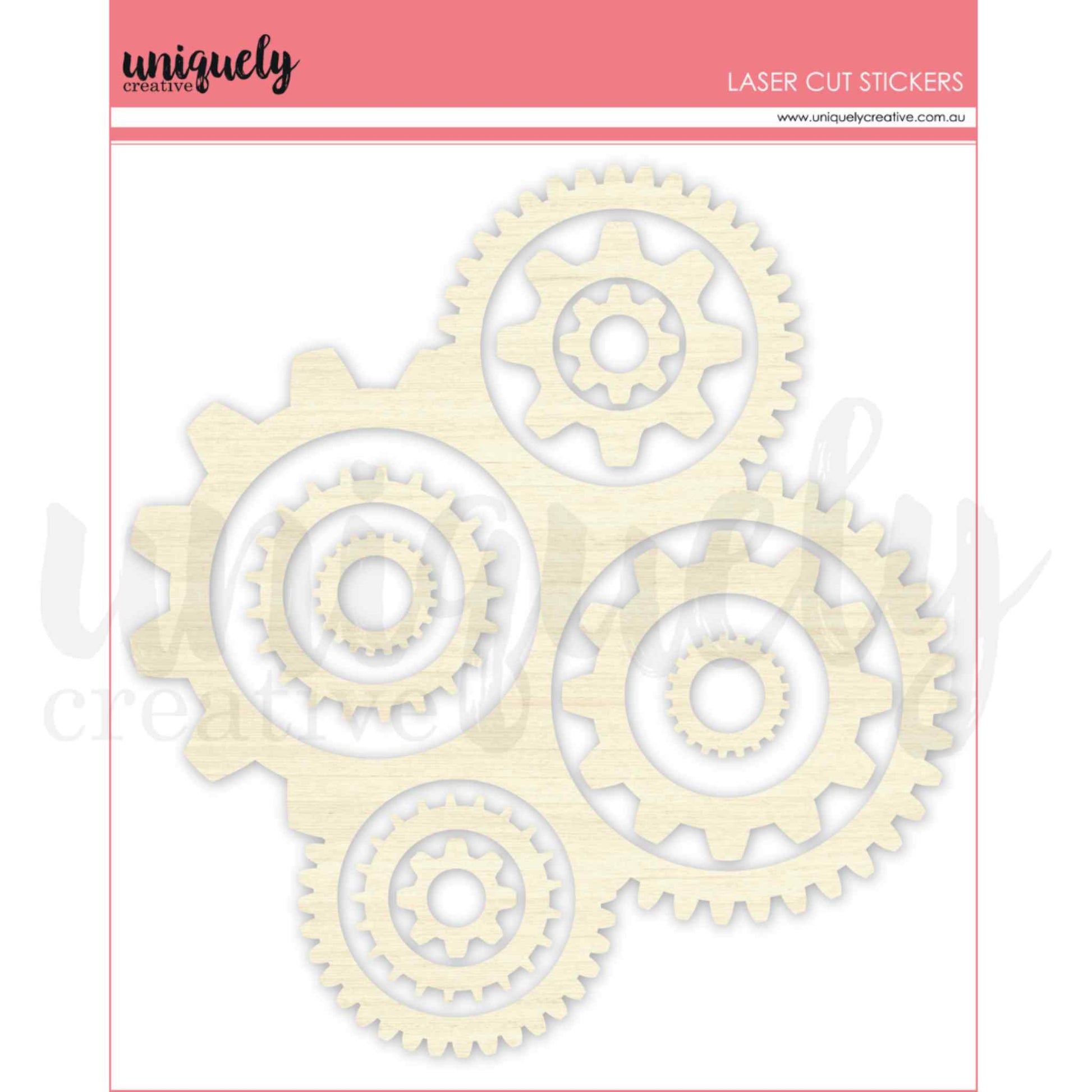 Uniquely Creative Wooden Cogs Laser Cut Stickers showing an interlocking cluster of natural wood cog shapes with adhesive backing, ranging from 1¼" accent pieces to a large 9" × 10" statement cog, 1mm thick